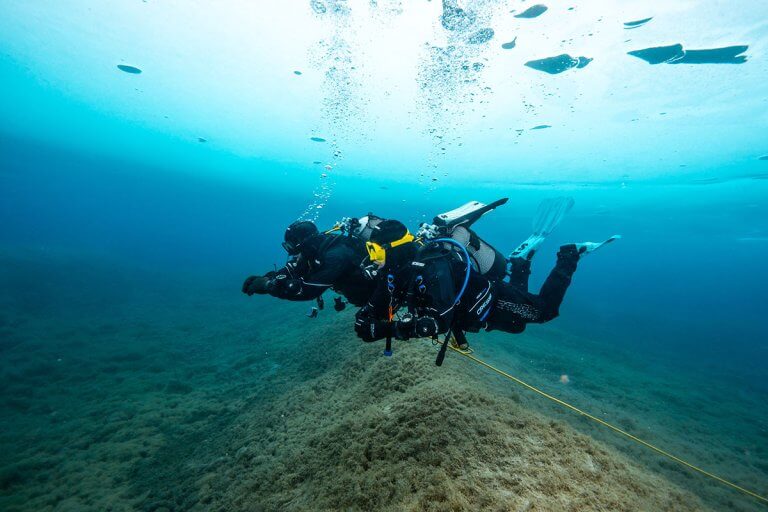 Scuba diving in Finland with clear blue water and underwater landscape
